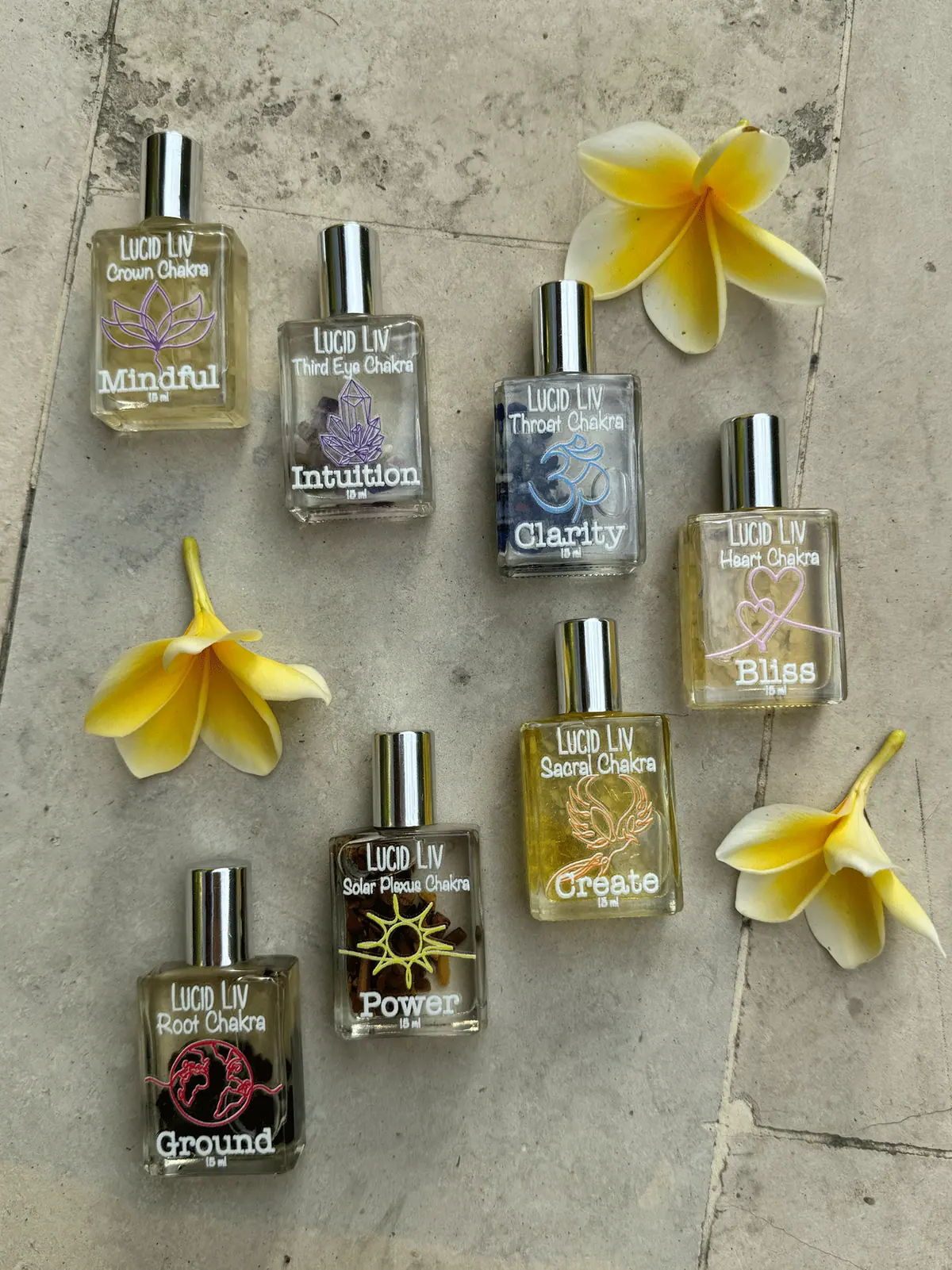 Lucid Liv chakra perfume range with flowers